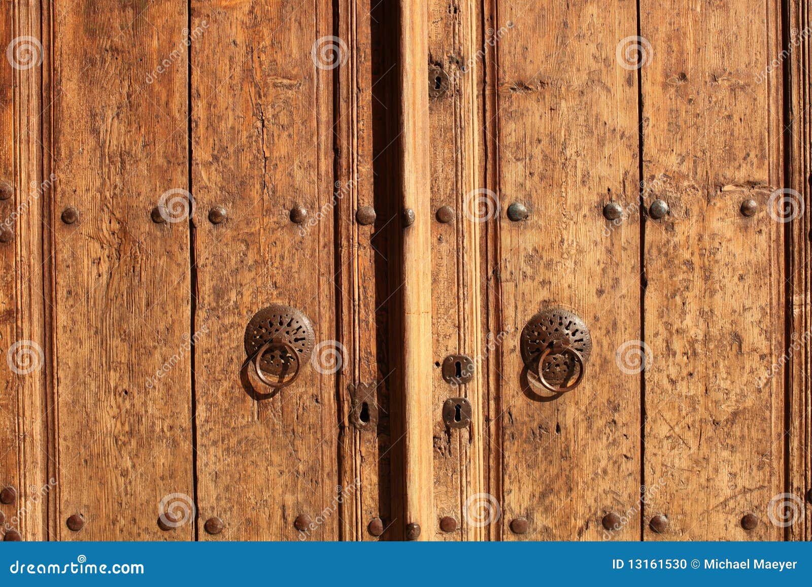 old door with knockers