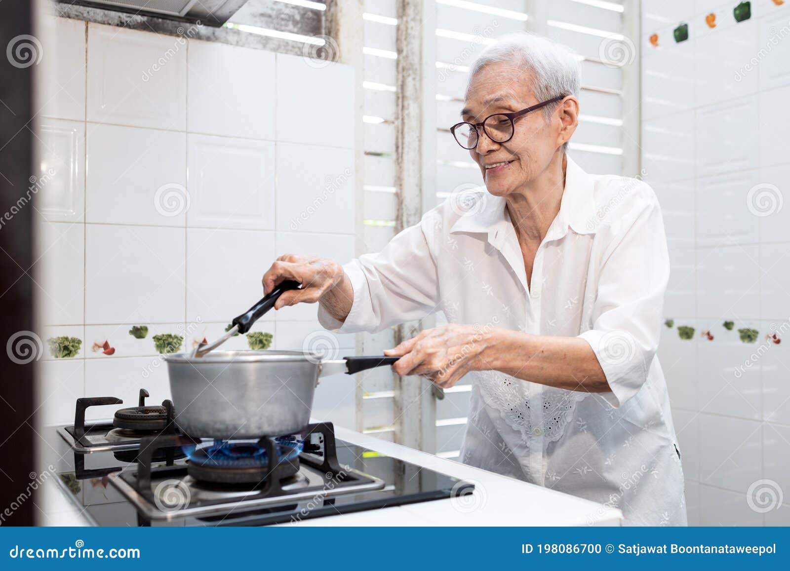 People Cooking And Stirring Chinese Food Capcay Stock Image