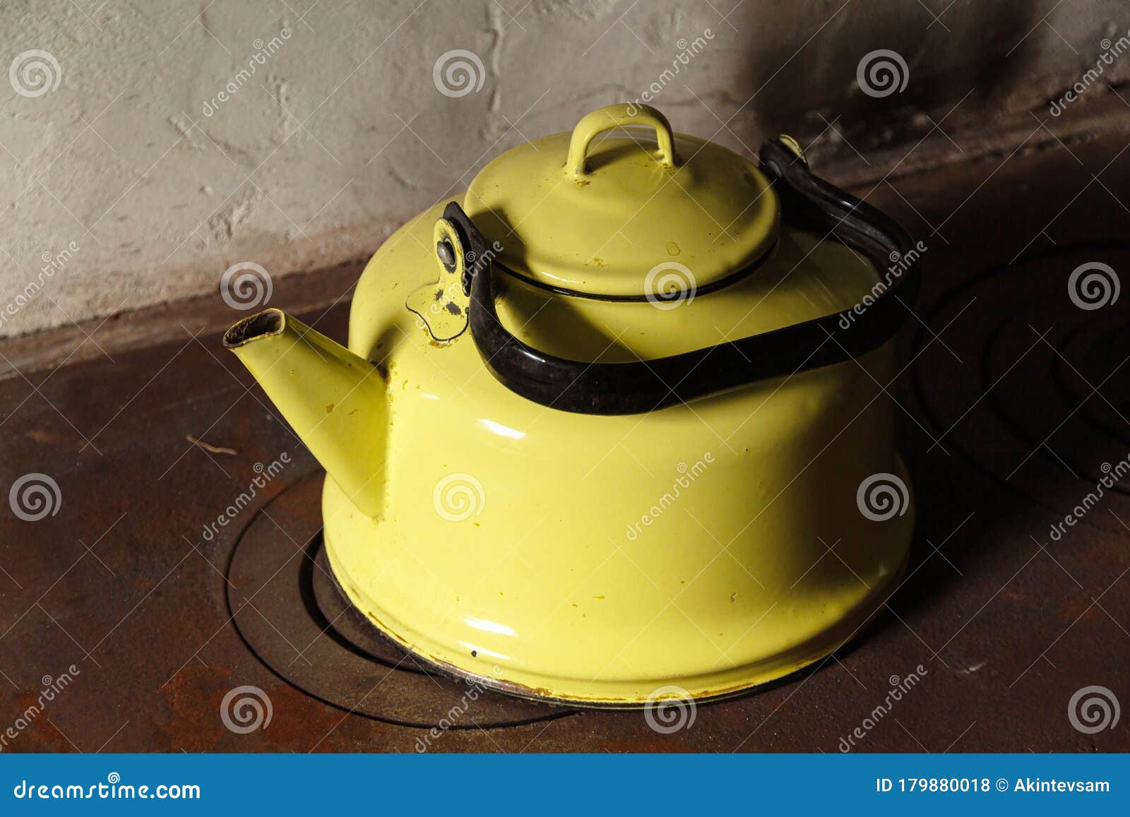 Old enameled yellow kettle stock photo. Image of rural 179880018