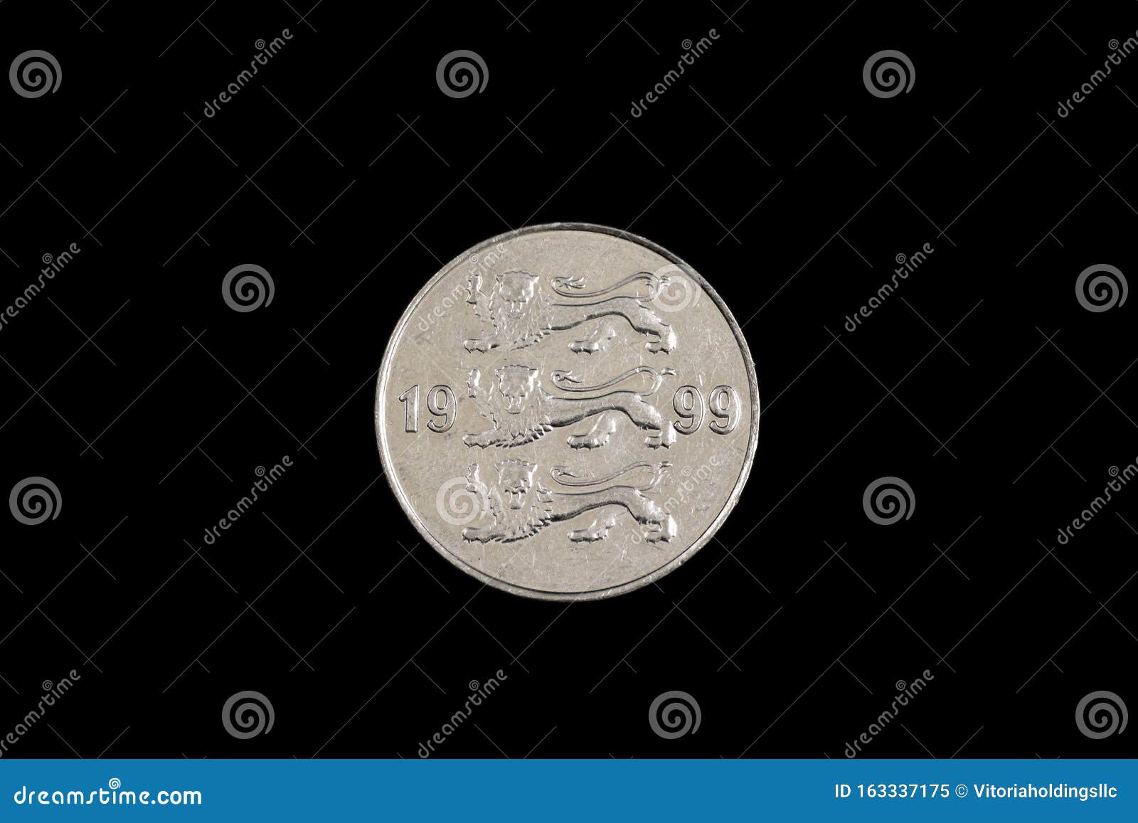 an old estonian coin  on black