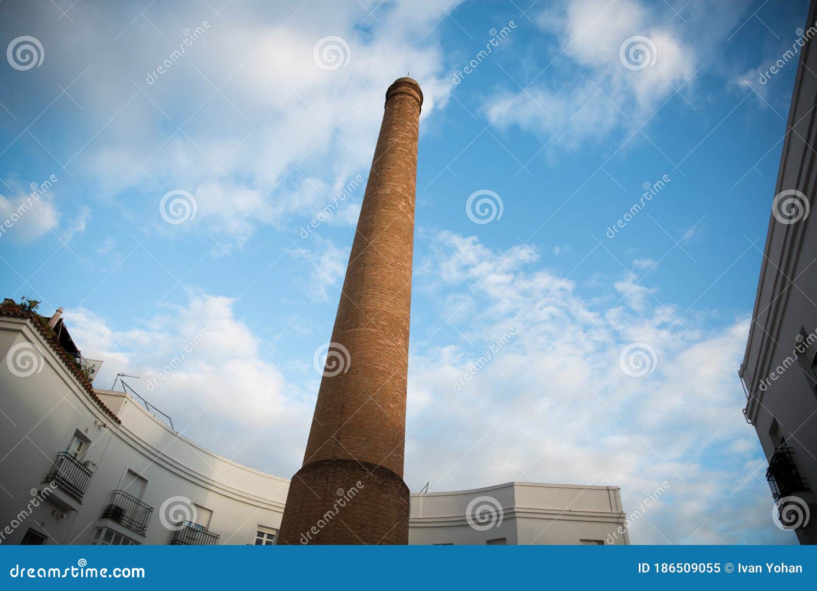 old factory chimney made of orange bricks in jerez de la frontera, south of spain