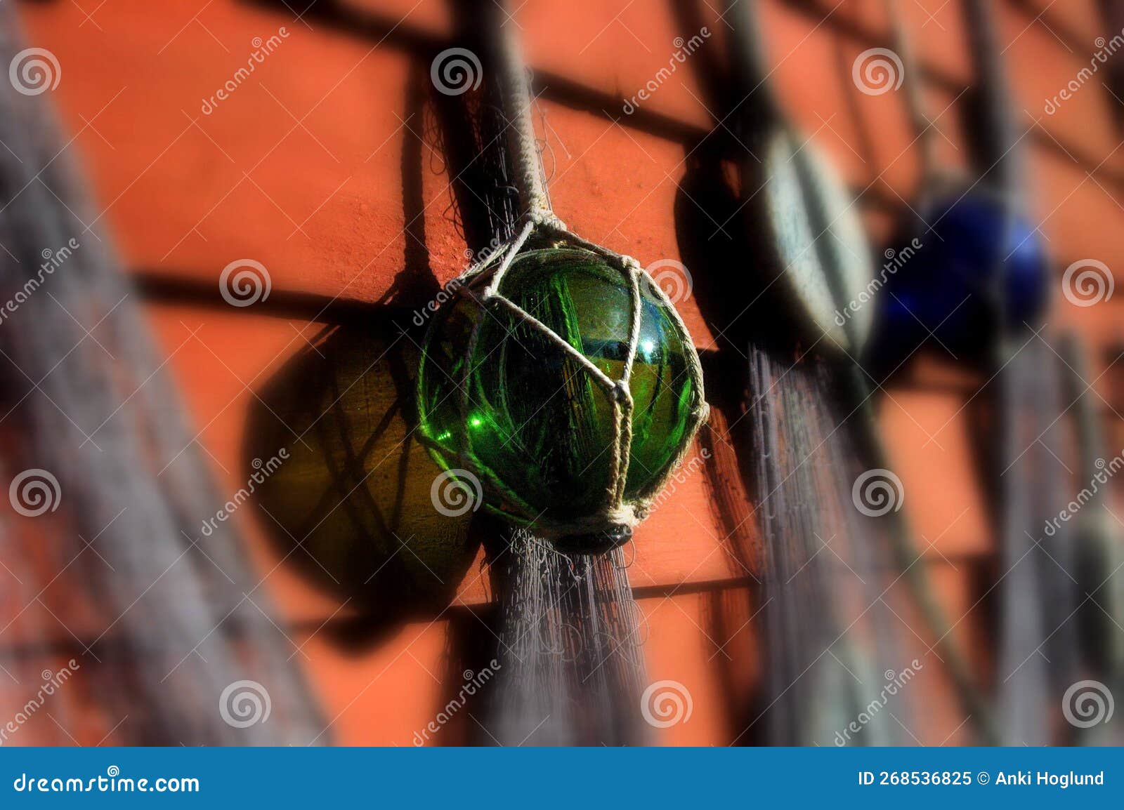 https://thumbs.dreamstime.com/z/old-fashioned-fishing-net-colorful-glass-balls-bobbers-hanging-red-wall-268536825.jpg