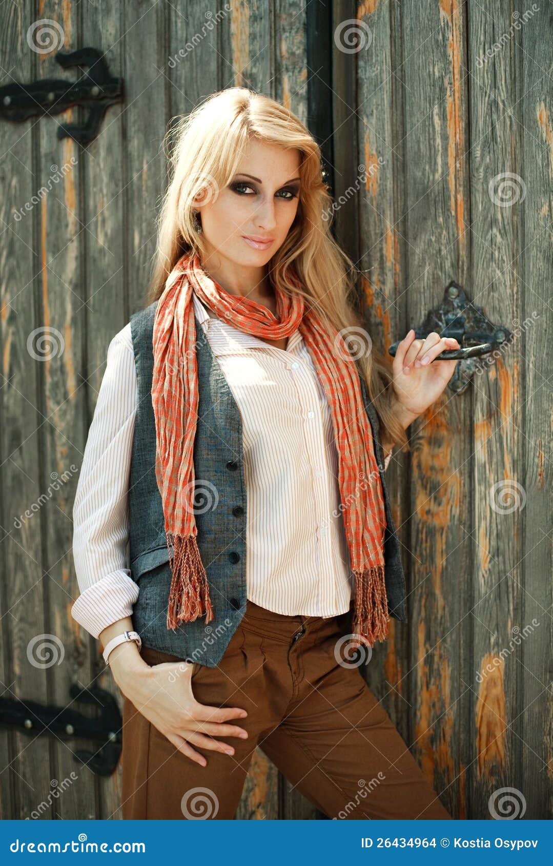 Old Fashioned Girl Against Old Building Wall Stock Images 