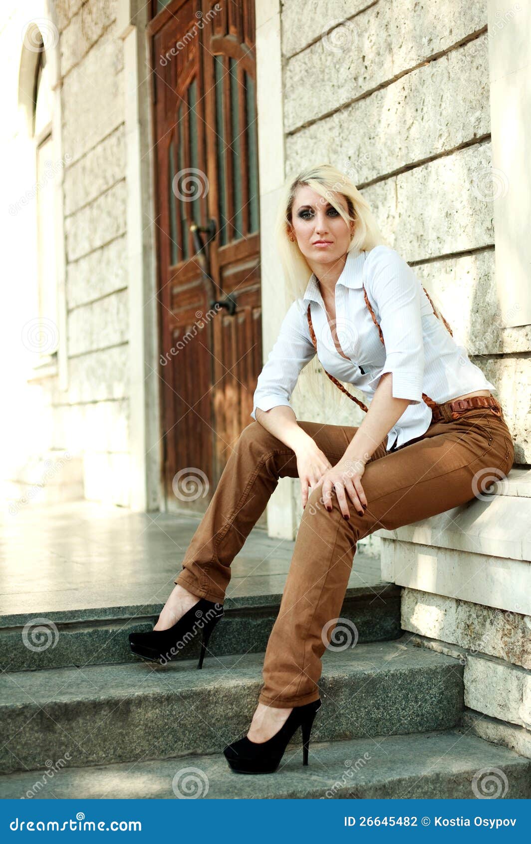Old Fashioned Girl Pose On The Vintage Building Stock