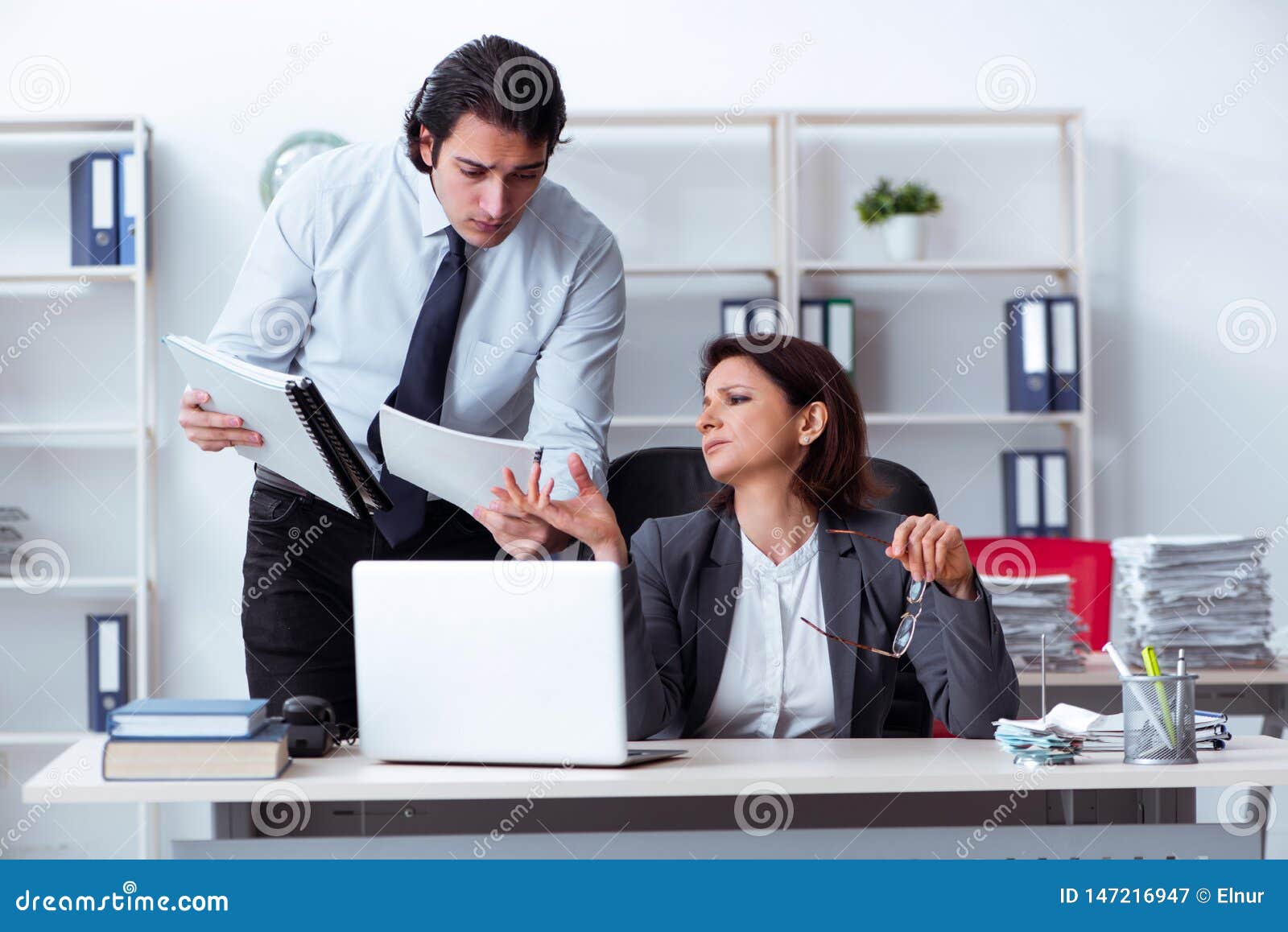 The Old Female Boss and Young Male Employee in the Office Stock Image -  Image of manager, assistant: 147216947