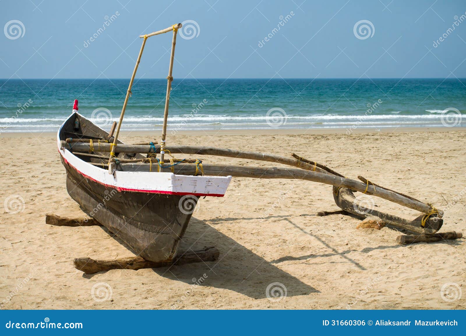 old fishing boat on the sandy shore royalty free stock