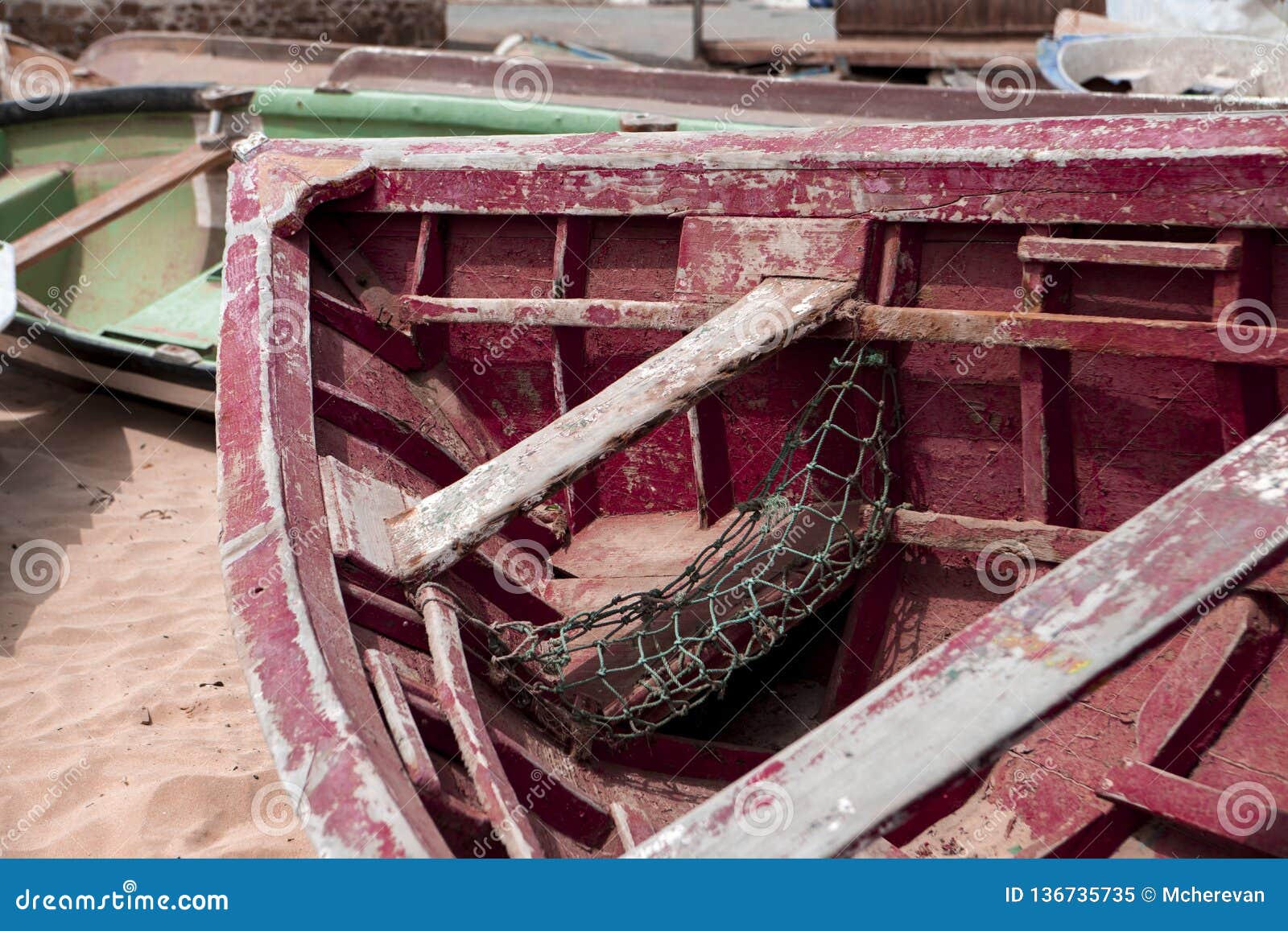 Old Fishing Boat on the Shore. Boat with Nets Waiting for