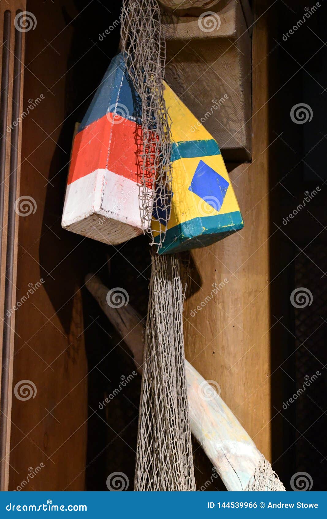 Old fishing net and buoys stock photo. Image of equipments 144539966