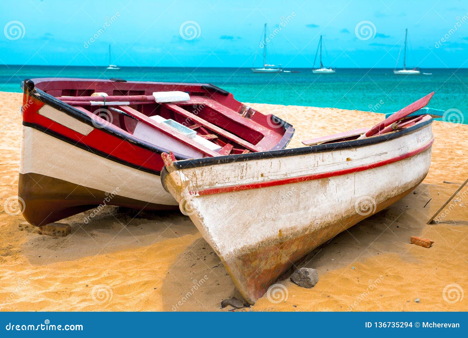 https://thumbs.dreamstime.com/z/old-fishing-pubes-beach-colorful-boats-cape-verde-136735294.jpg