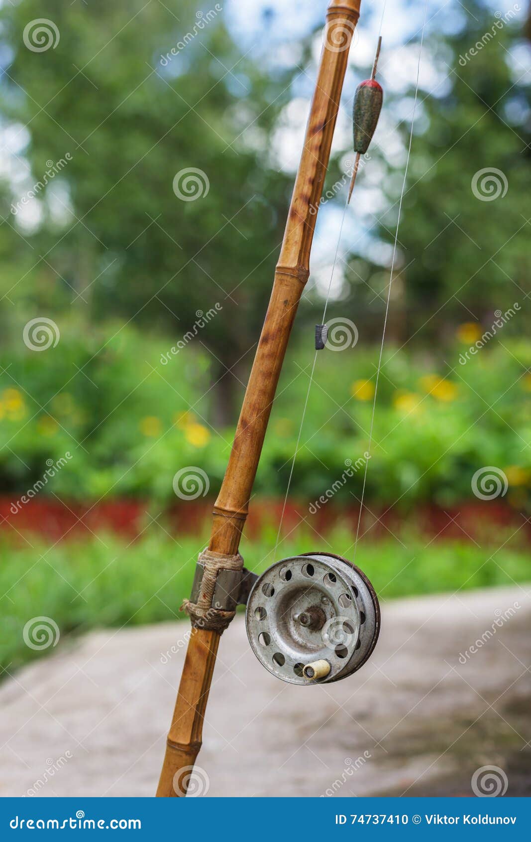 Old Fishing Rod on Nature Background Stock Photo - Image of line