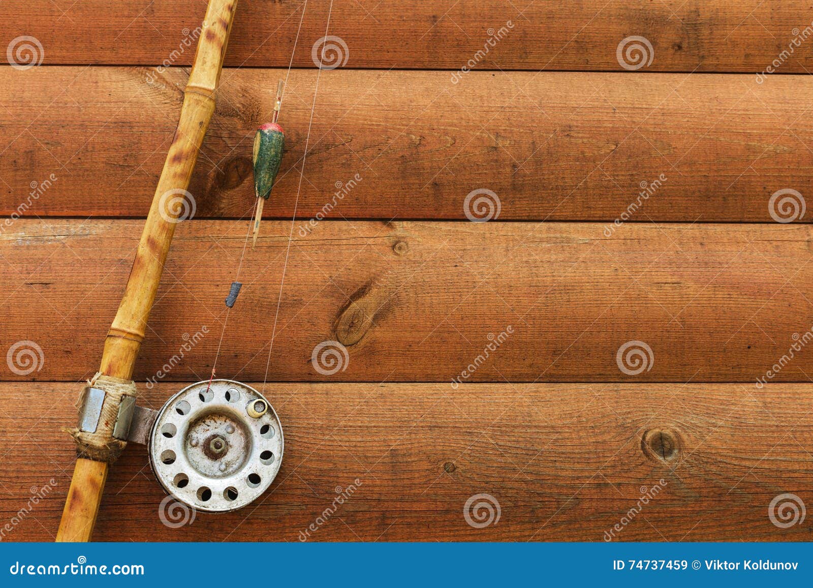 Old Fishing Rod on Wooden Background Stock Image - Image of retro