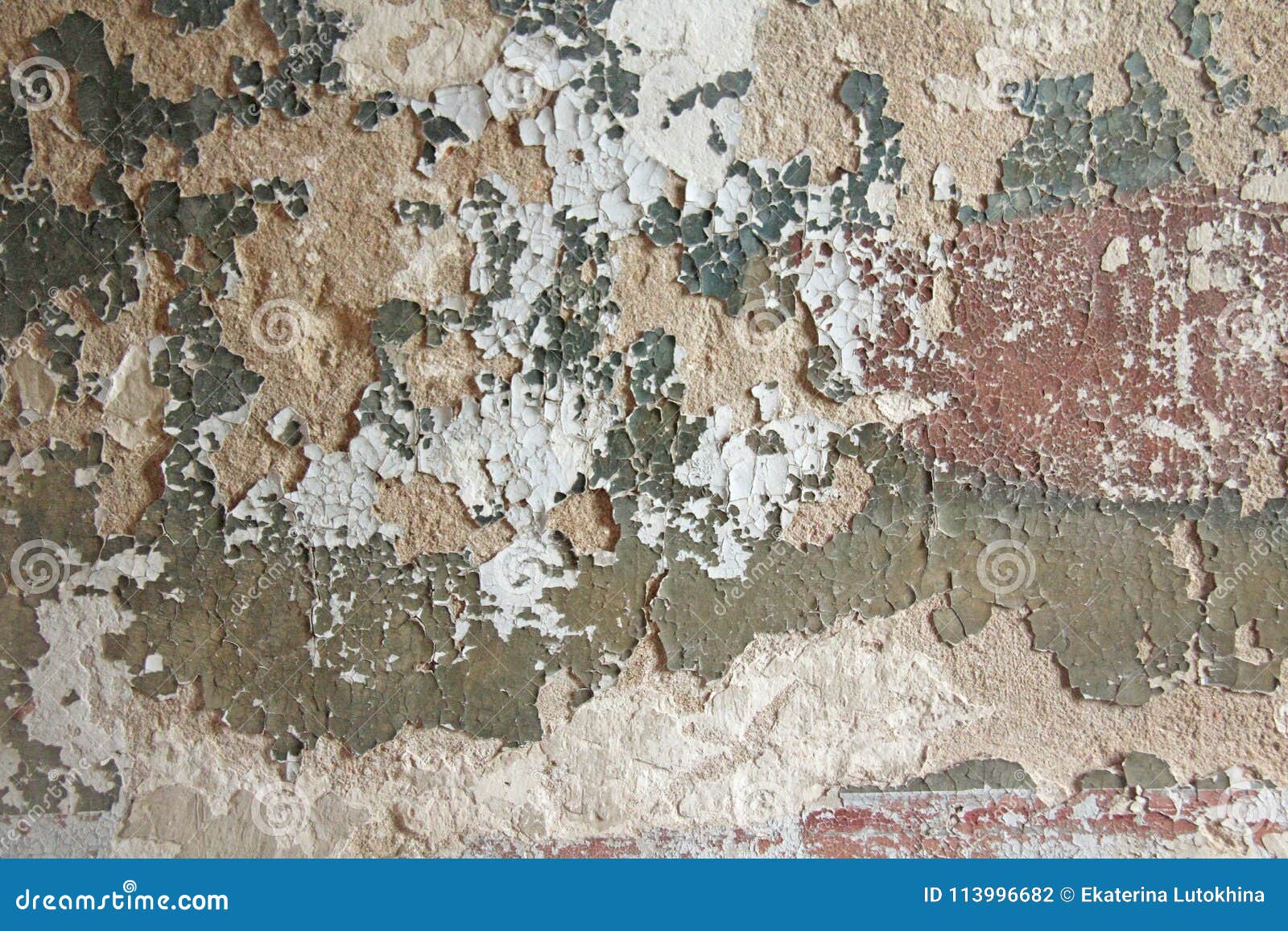 Old Flaky White Paint Peeling Off A Grungy Cracked Wall