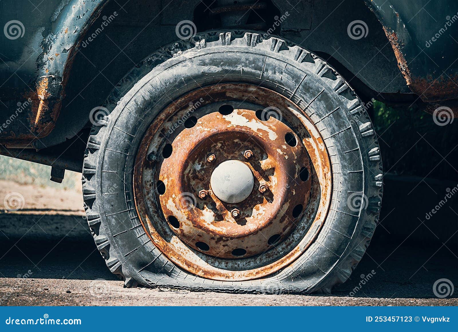 An Old Flat Tire On A Rusty Car Stock Image Image Of Side Wheel