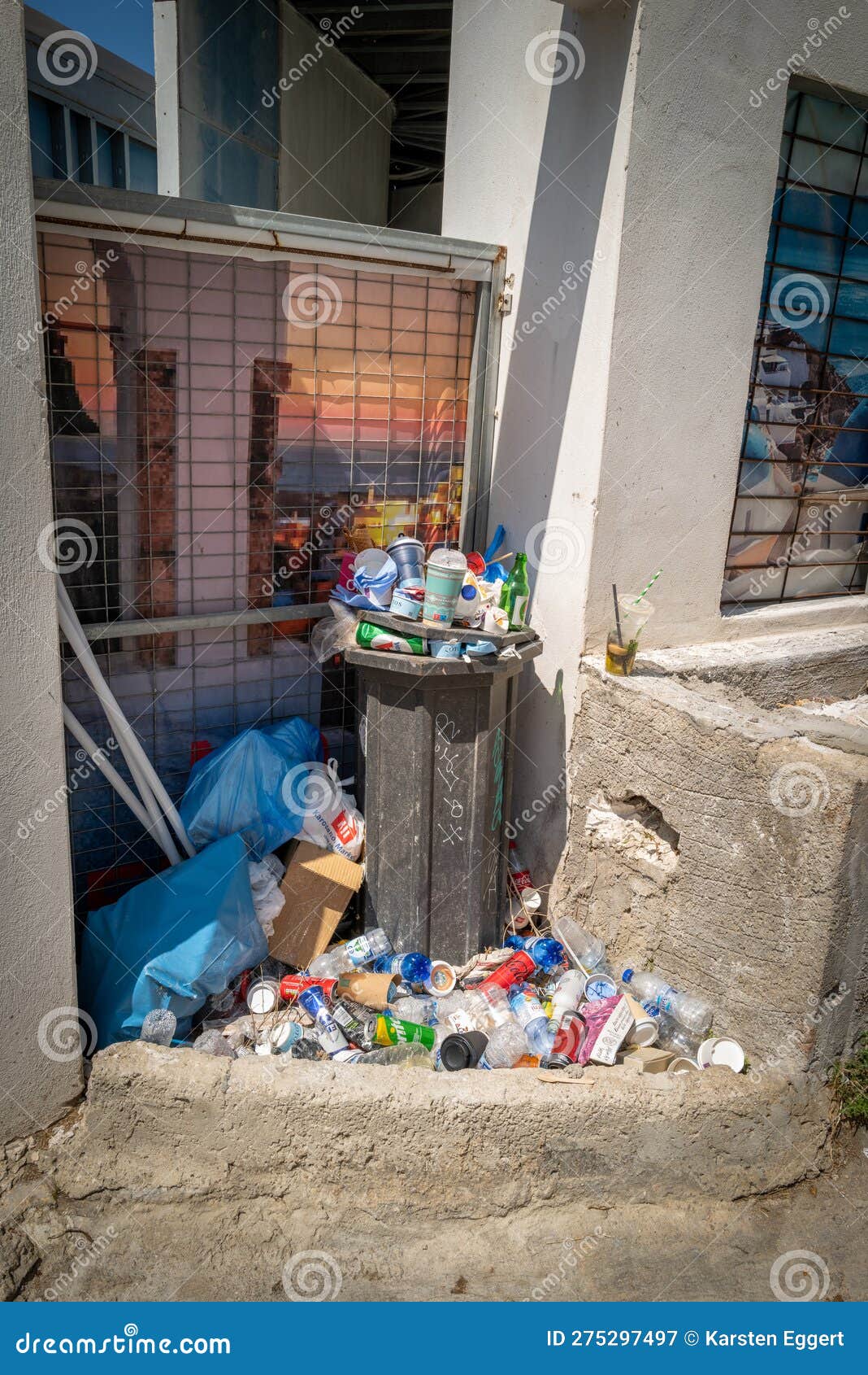 A Garbage Can is Overflowing with Garbage Editorial Photography Image