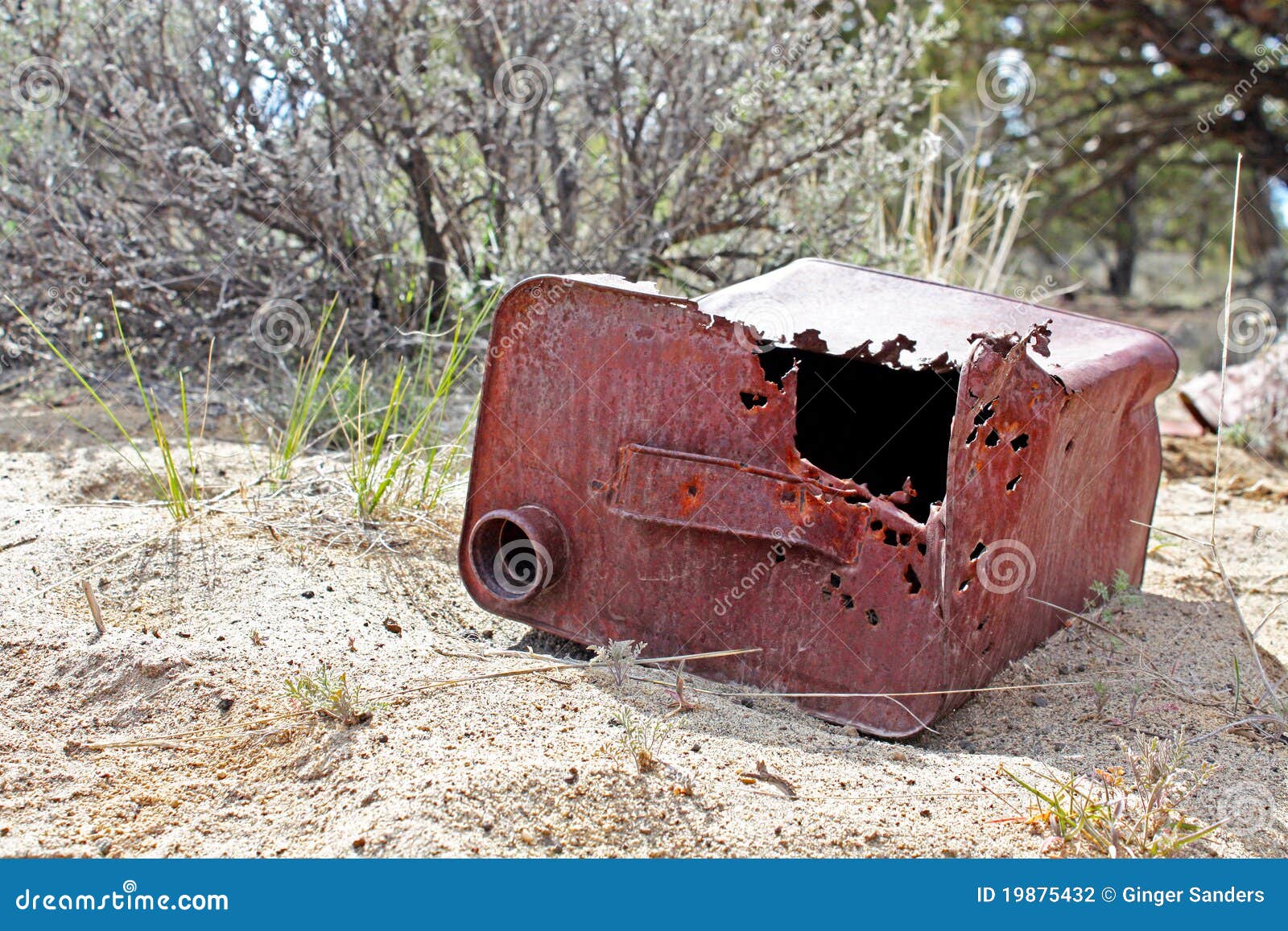 Old Gas Can Laying in Sand stock photo. Image of desert 19875432