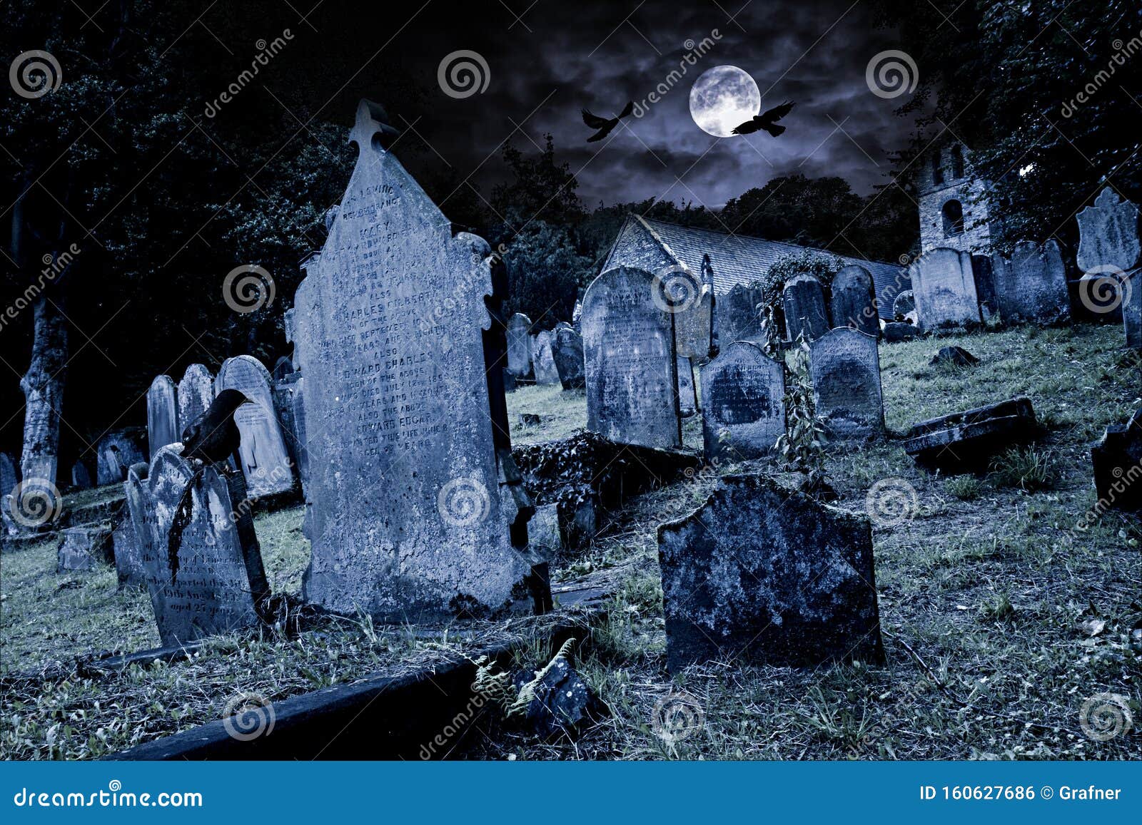 old graveyard with ancient tombstones grave stone and old church front of full moon black raven dark night spooky horror