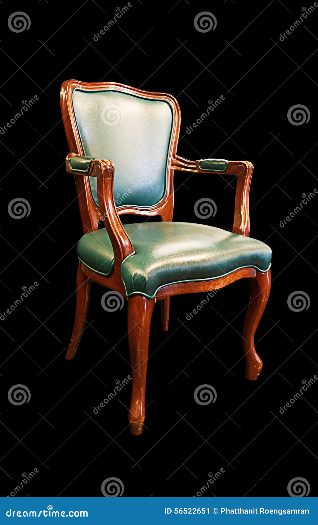 old green leather chair isolated on black