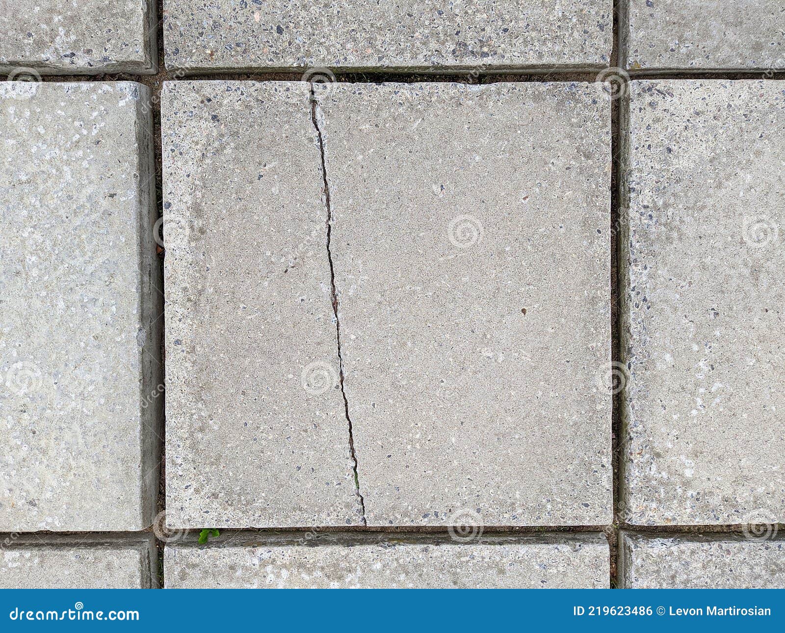 Old and Grey Concrete Slab with Cracks in Daytime Stock Photo Image