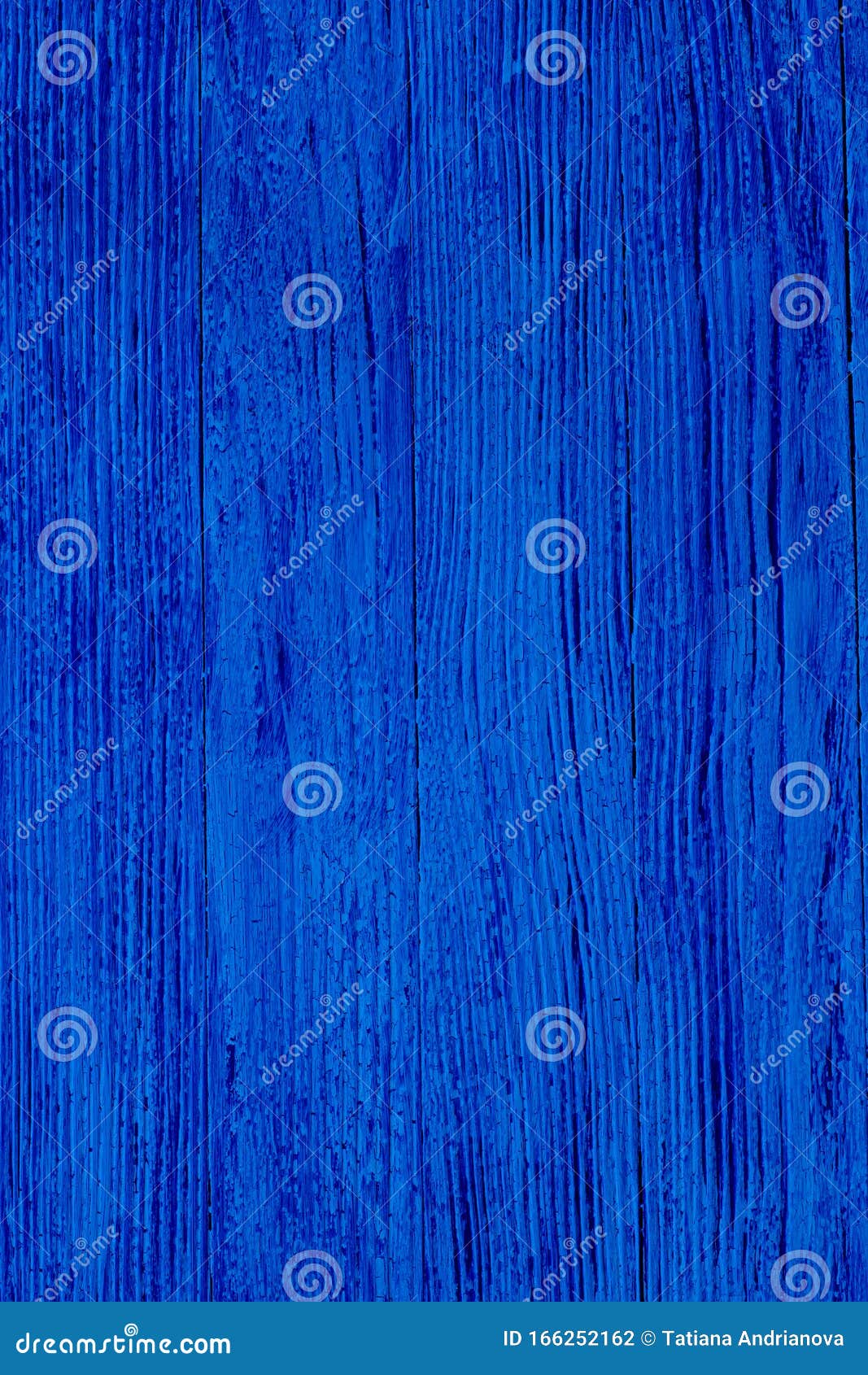 old grunge wooden background with cracked paint. classic, blue monochrome, trend 2020, vertical