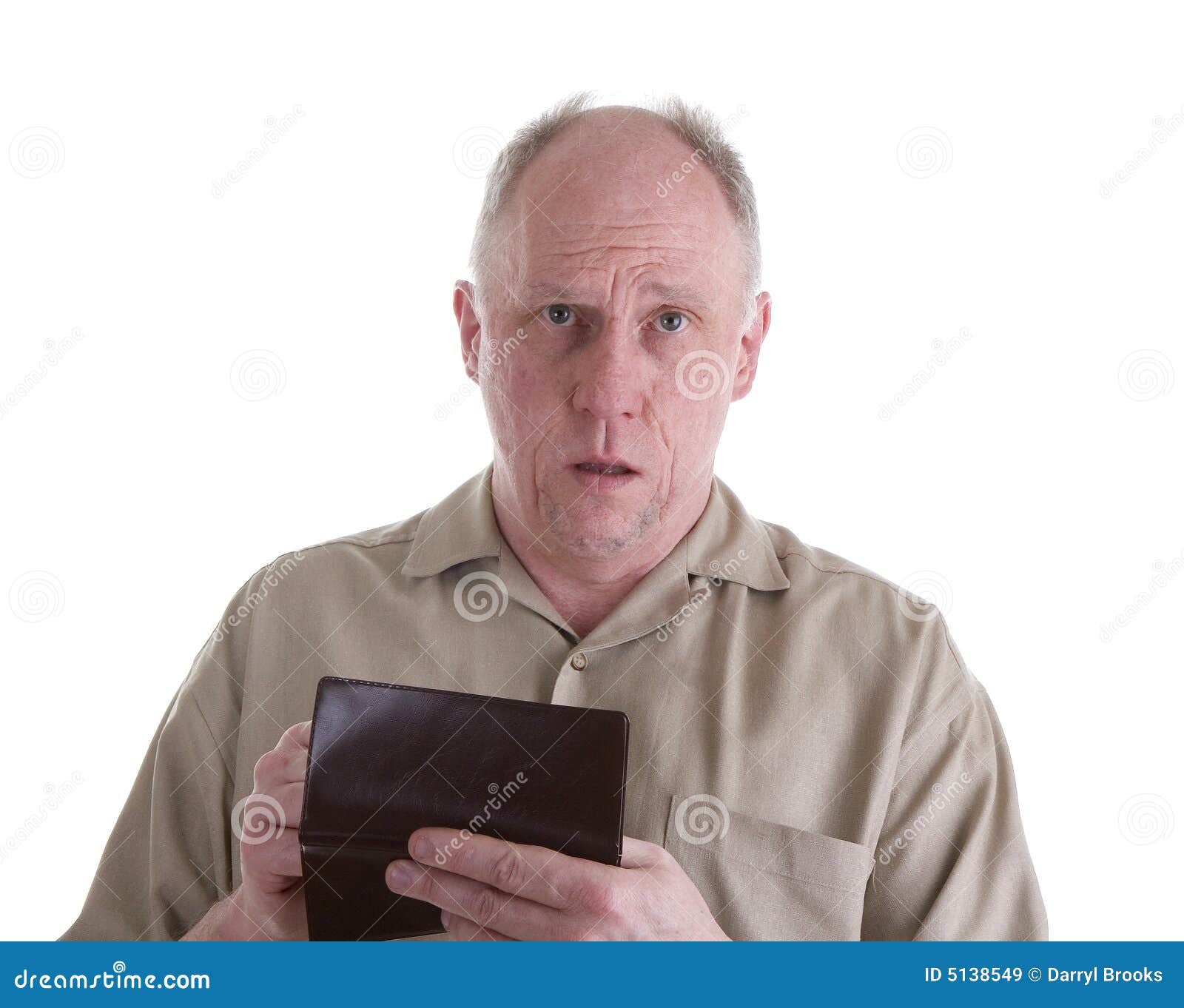 Free Photo  Mature man pretending to show something in shirt