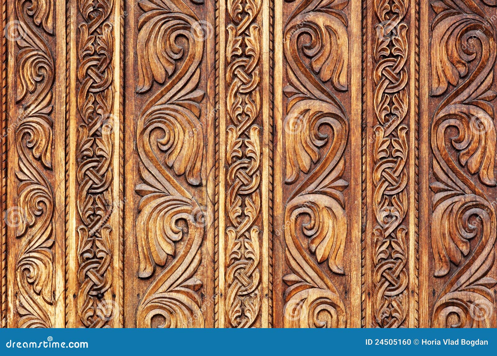 old hand-carved wooden pattern on a monastery door