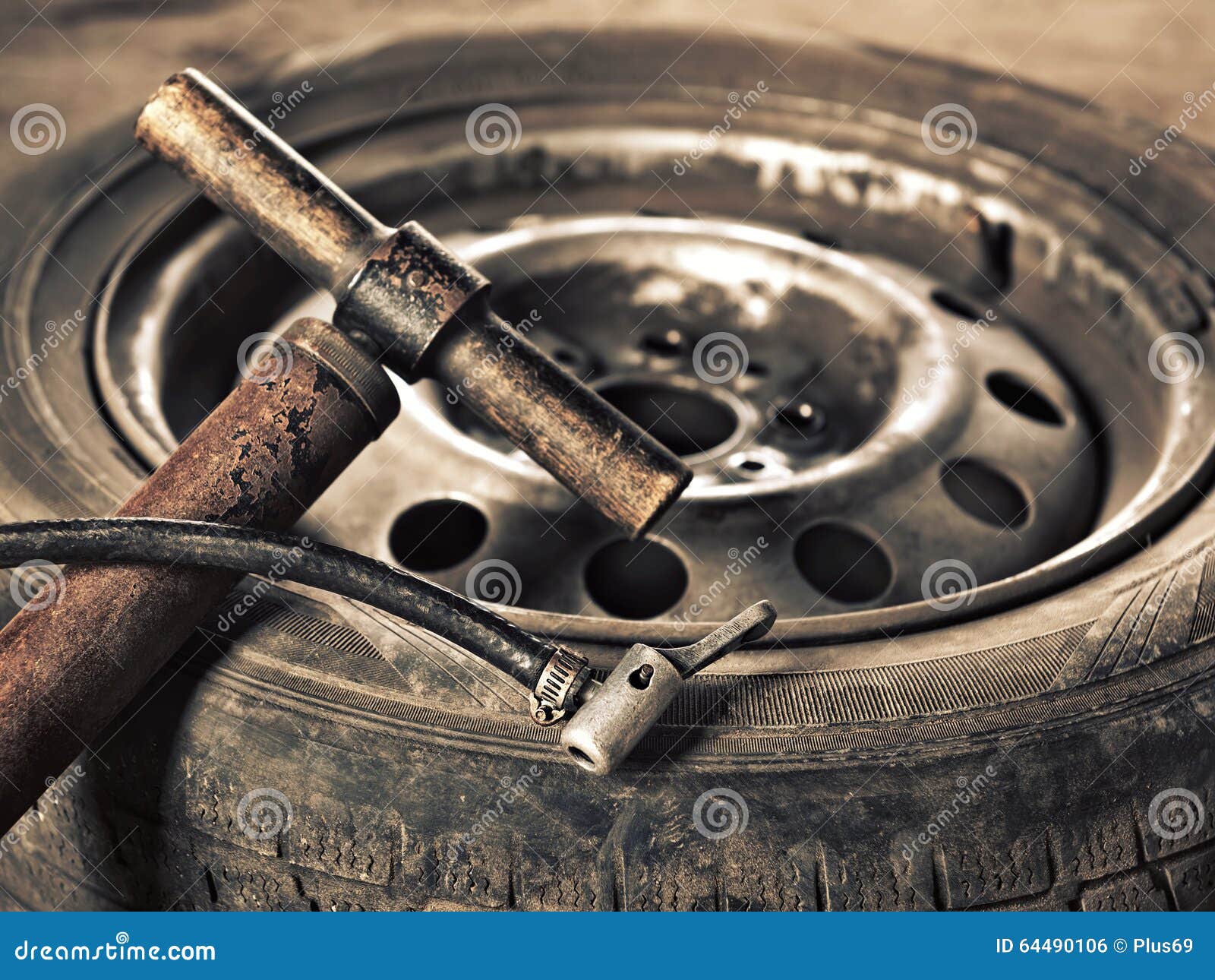 Old Handpump and Car Wheel Closeup Stock Photo Image of white
