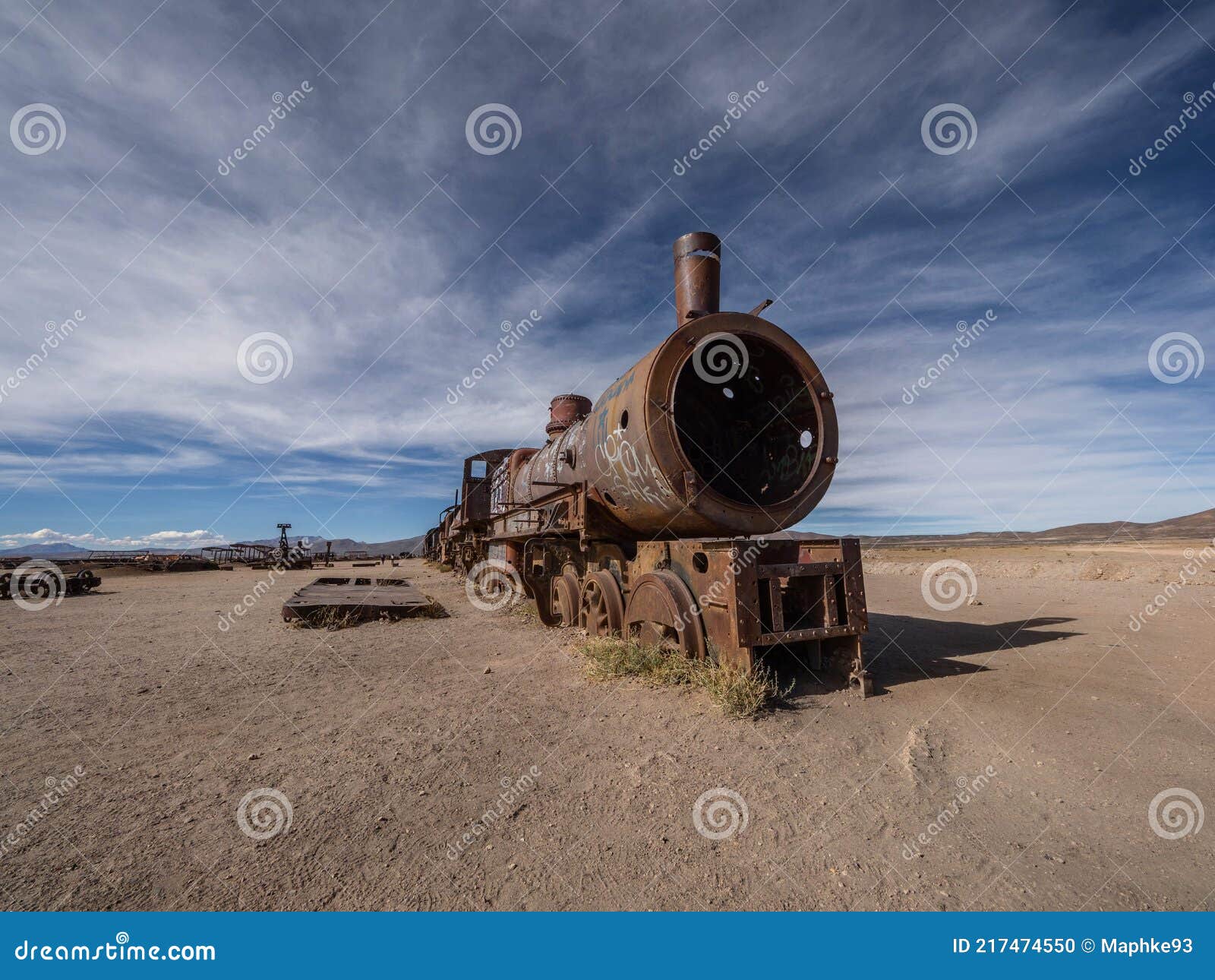 old historic abandoned train engine locomotive ruins at cementerio de trenes cemetery graveyard, salar de uyuni bolivia