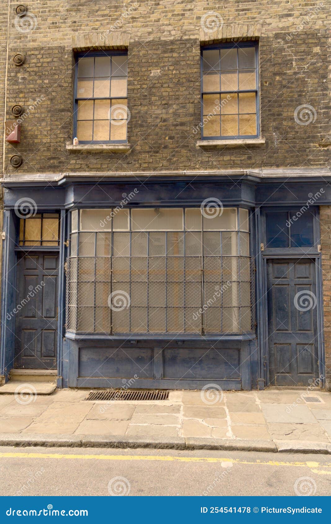 old house facade store doors abandoned barred