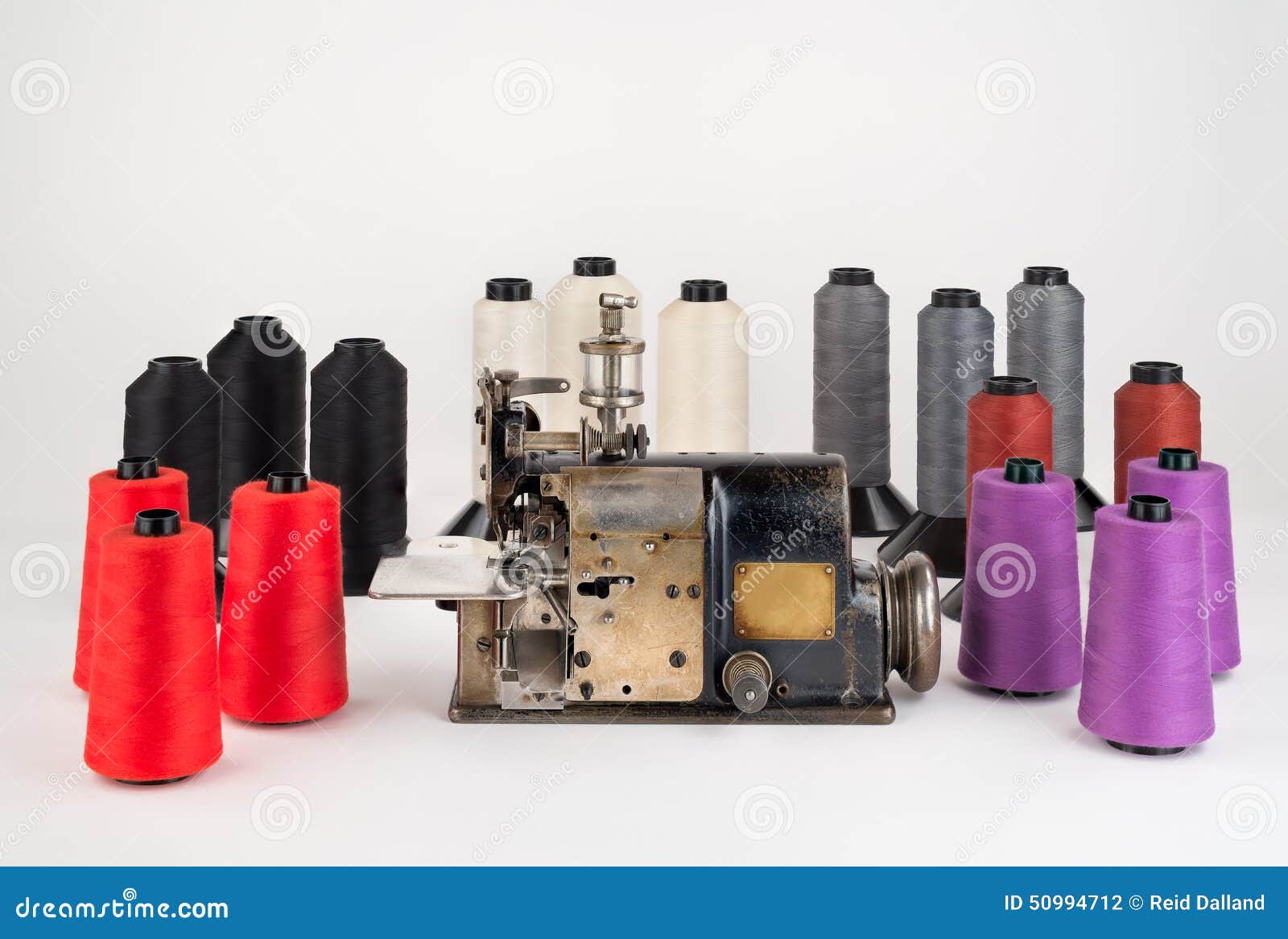 Old Industrial Sewing Machine with Spools of Thread. Stock Photo Image of closeup, fashioned