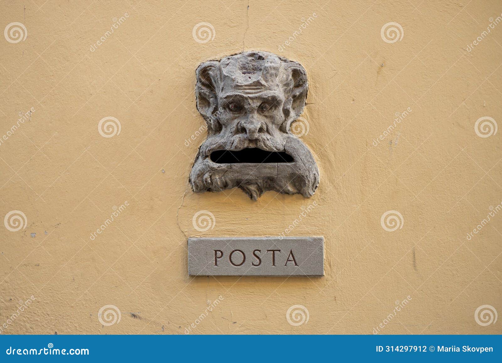 old italian mail slot with text posta in old wall