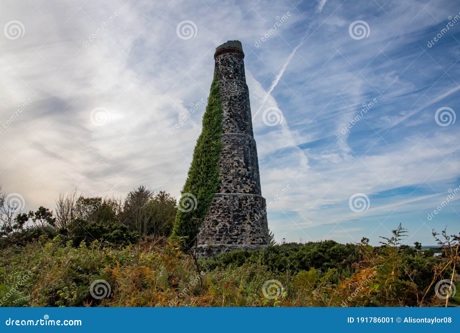 an old, ivy-covered mine chimney in cornwall