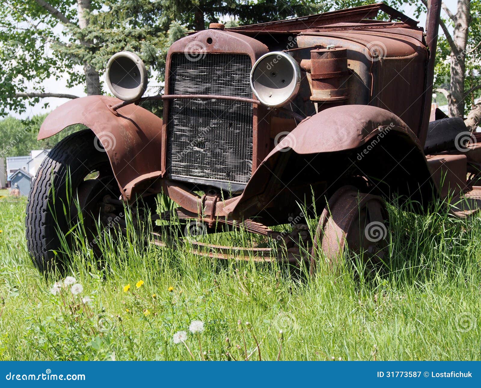 Old Jalopy Rusting Away in Tall Grass Stock Image Image of heritage