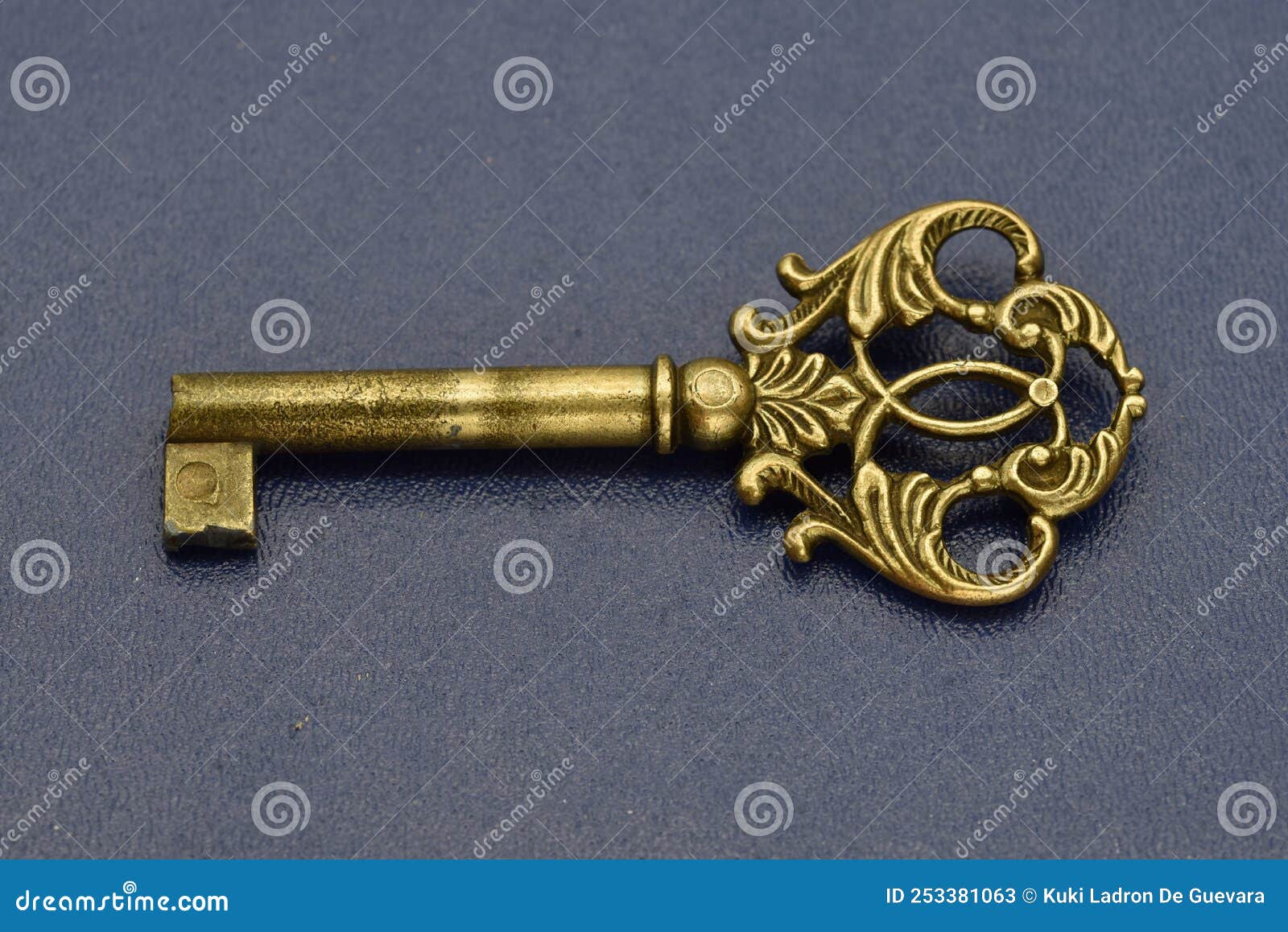 old key on blue background