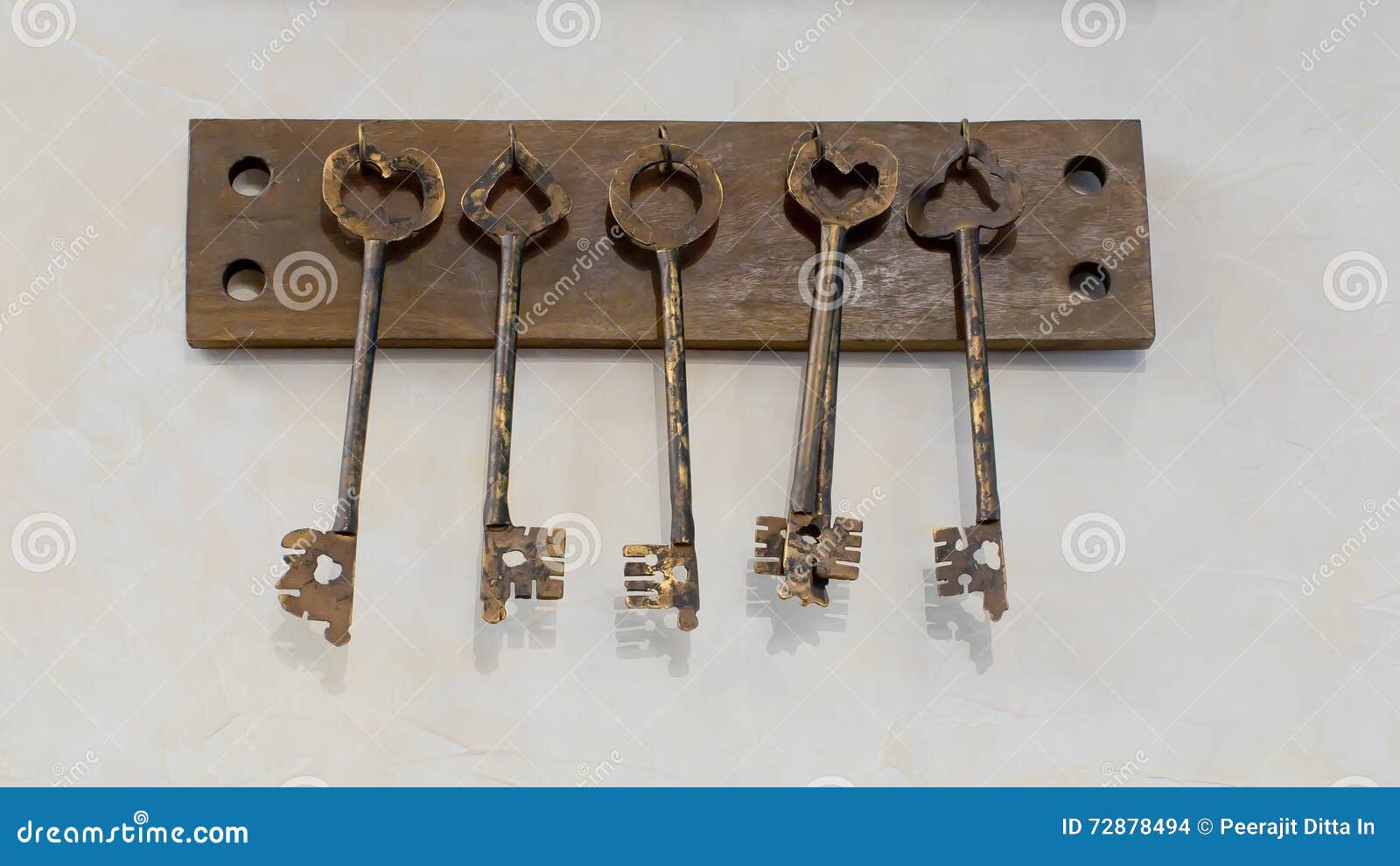 Old Keys with Key Hanging on a White Wall of an Old Hotel Stock Photo