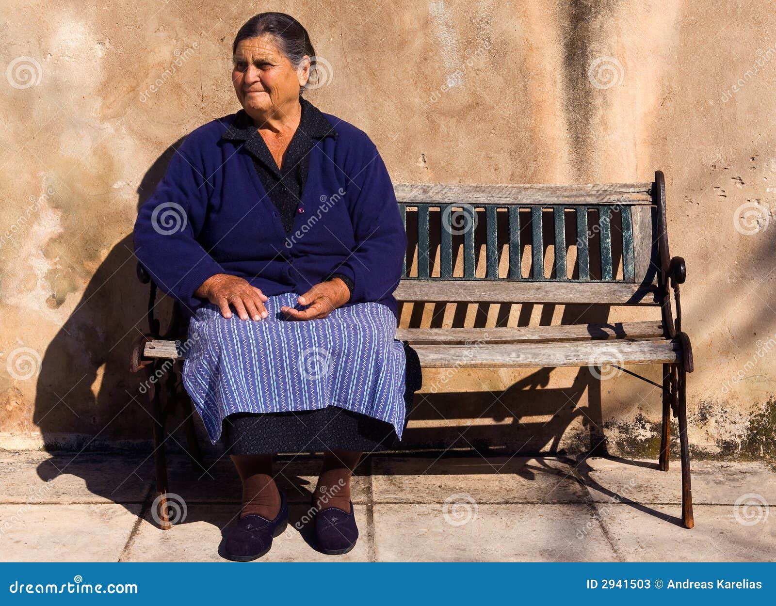 old lady in a greek village