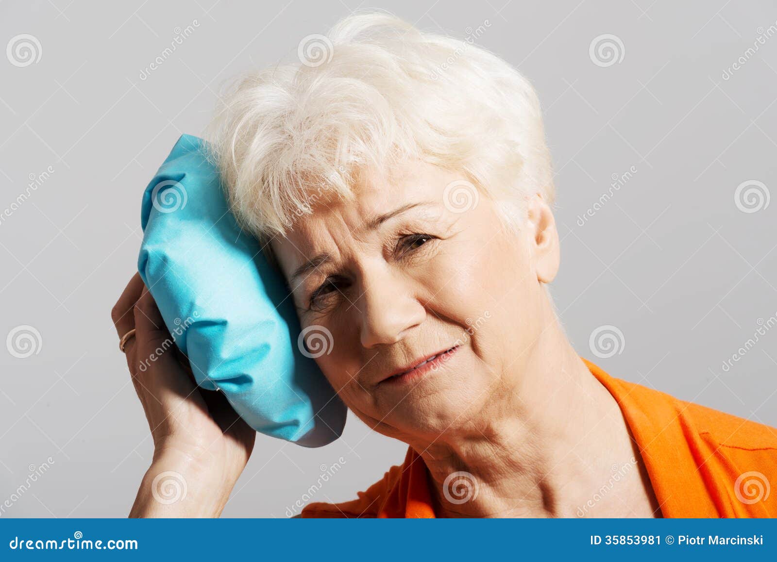 An Old Lady With Ice Bag By Her Head Stock Image Im