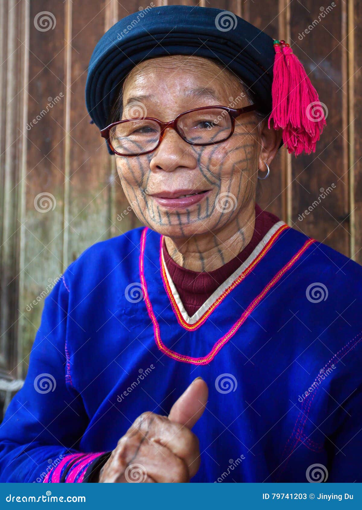 the old li nationality lady on their traditional dress