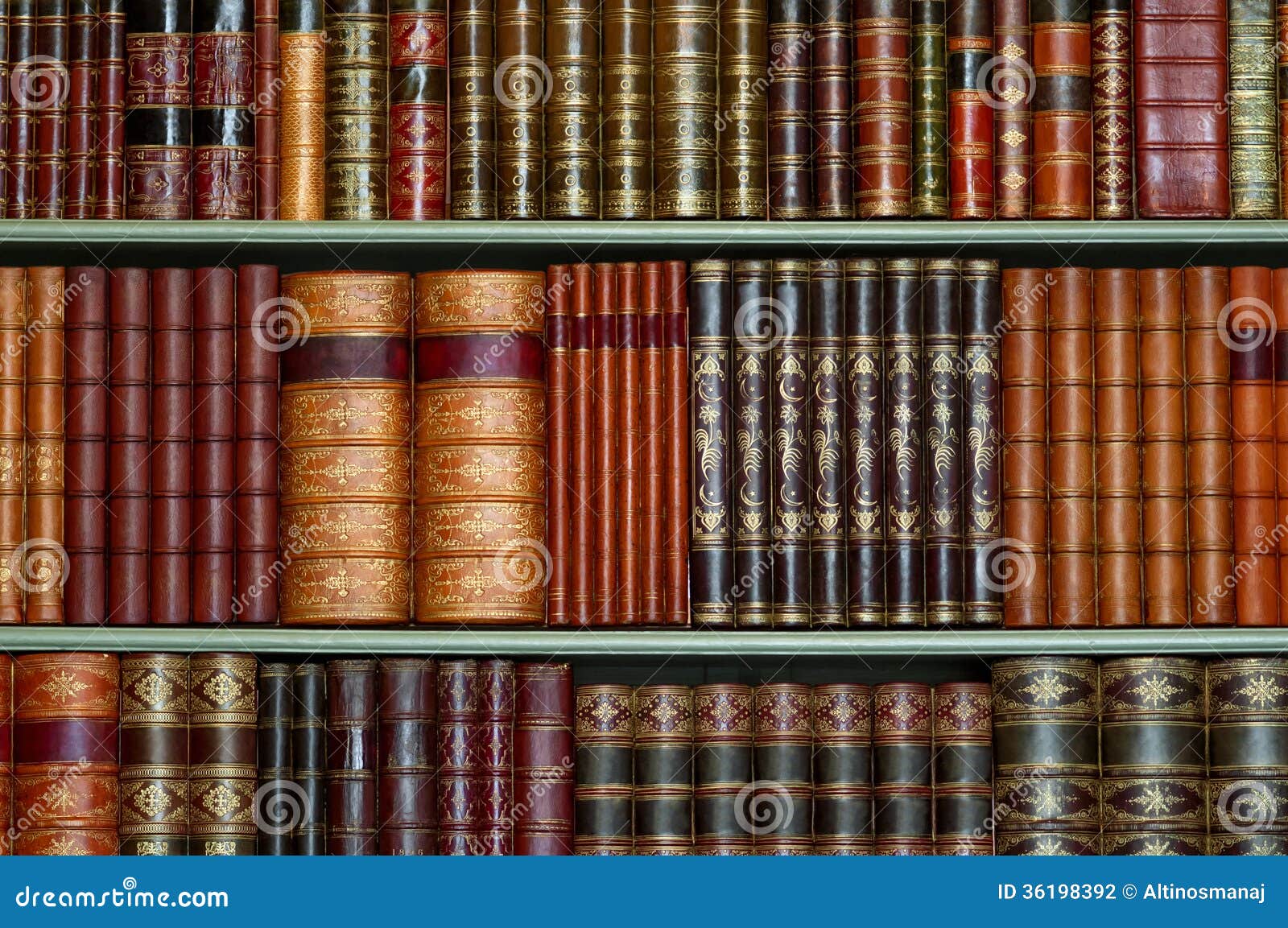 old library of vintage hard cover books on shelves