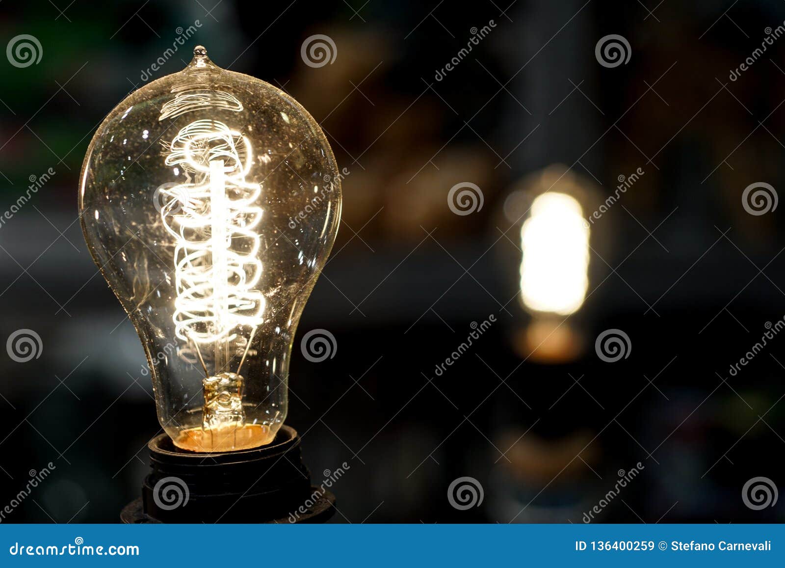 Old Light Bulb Glowing in Dark . Close Up Stock Image Image of
