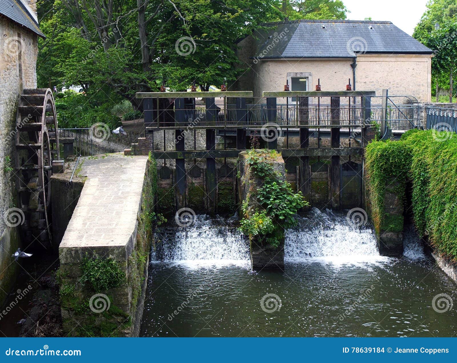 old locks in bayeux on the river aure, normandy.