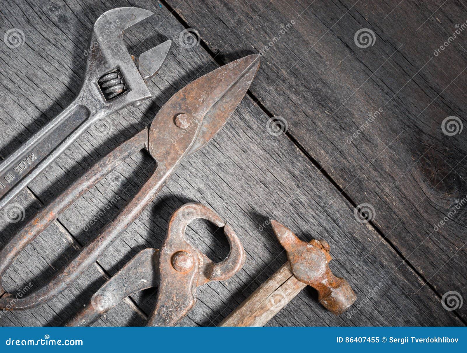 Old Locksmith Tools on a Gray and Cracked Wooden Background. Stock ...