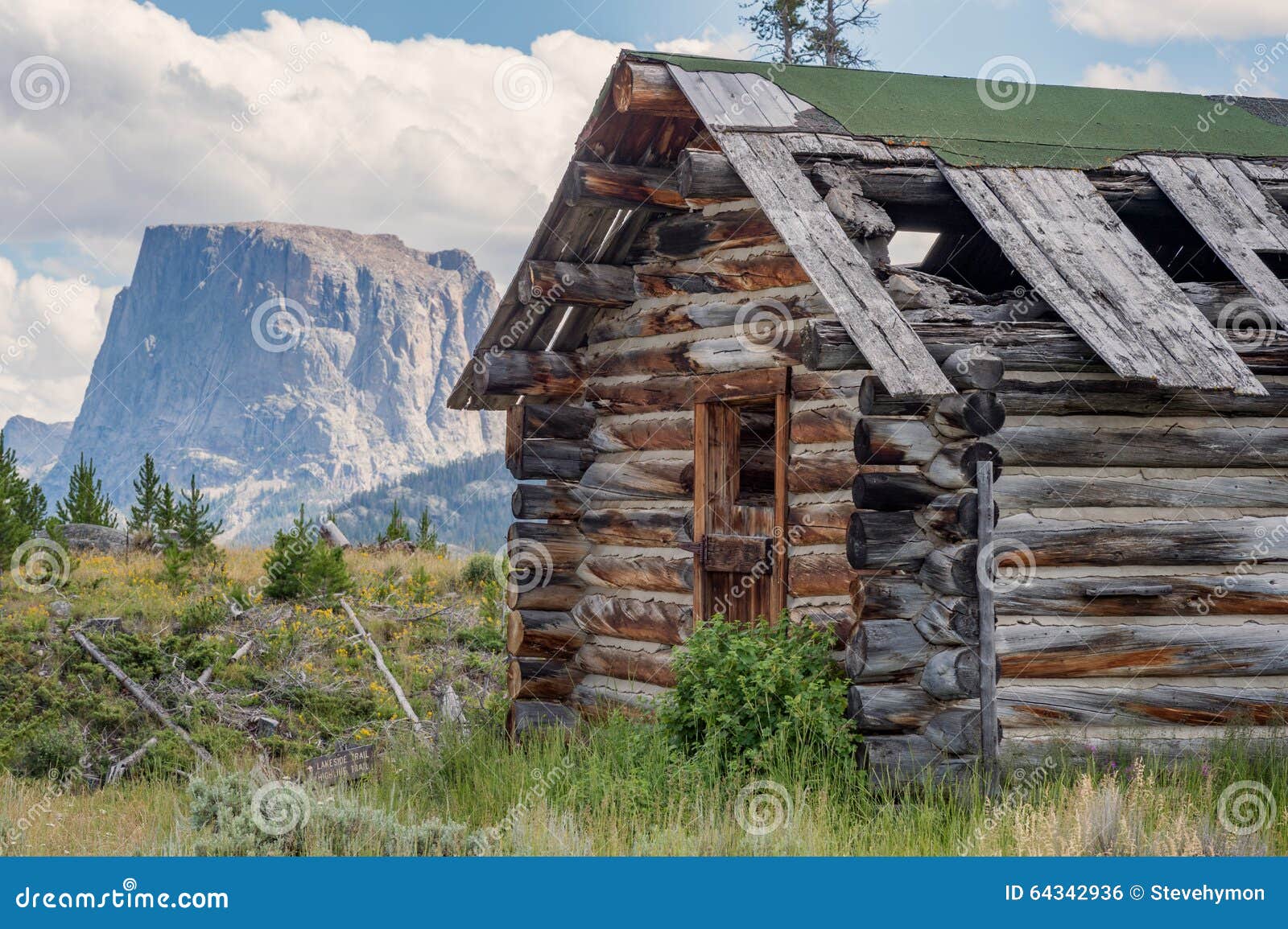 old log cabin and flat top mountain, wyoming