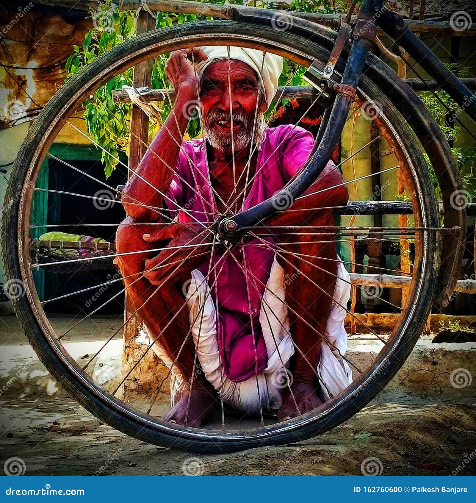 Download Old Man With Bicycle Wheels Editorial Image - Image of black, changed: 162760600
