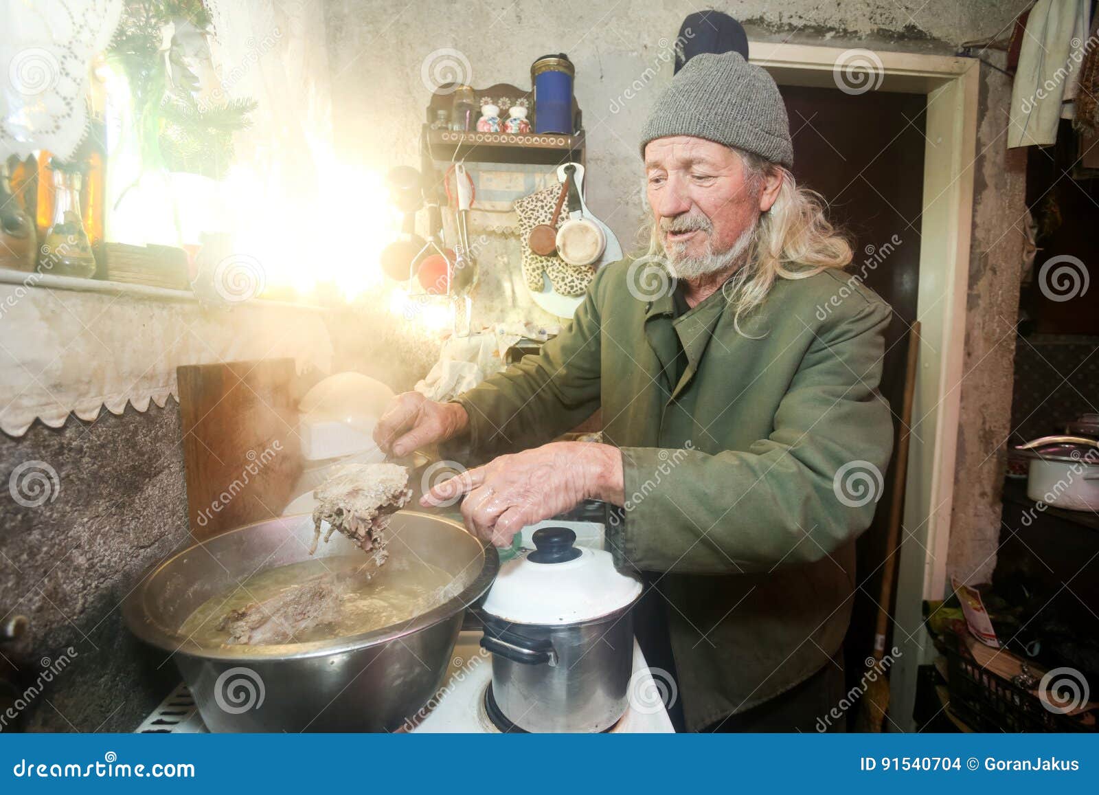 Old man boiling pork stock photo. Image of male, inside - 91540704