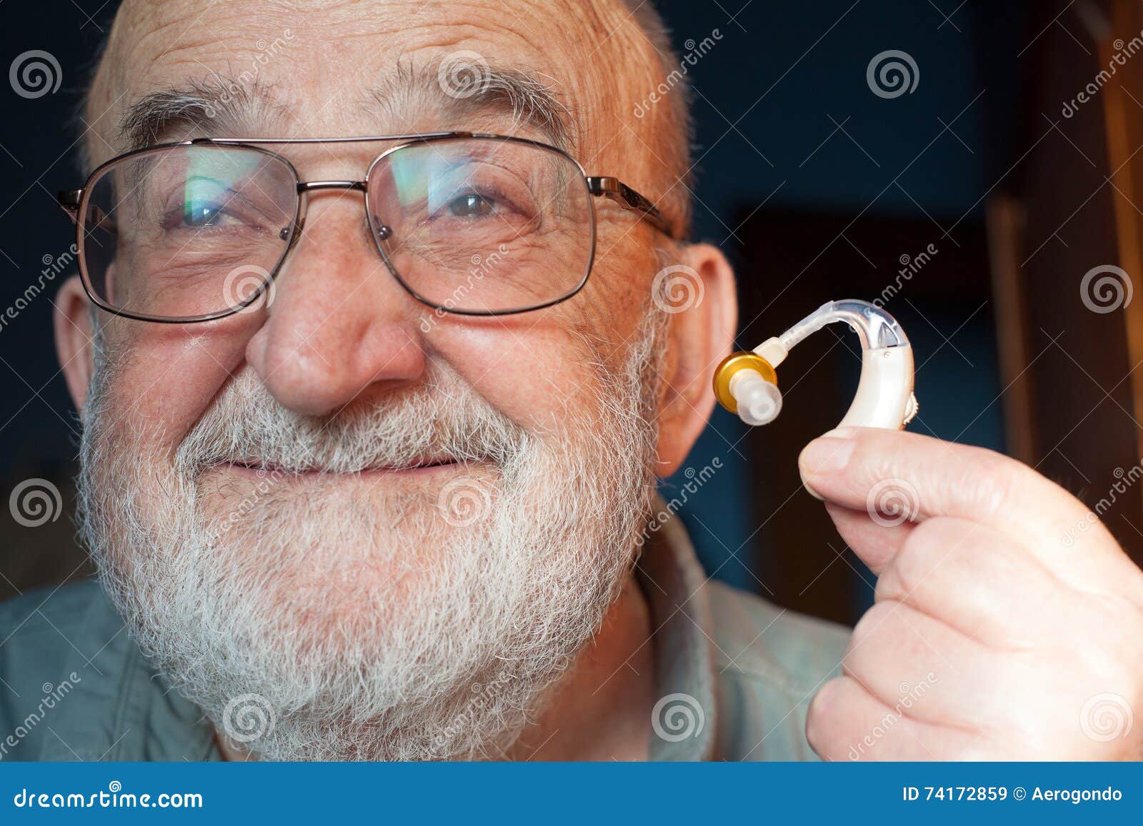 Old man with hearing aid stock image. Image of illness - 74172859