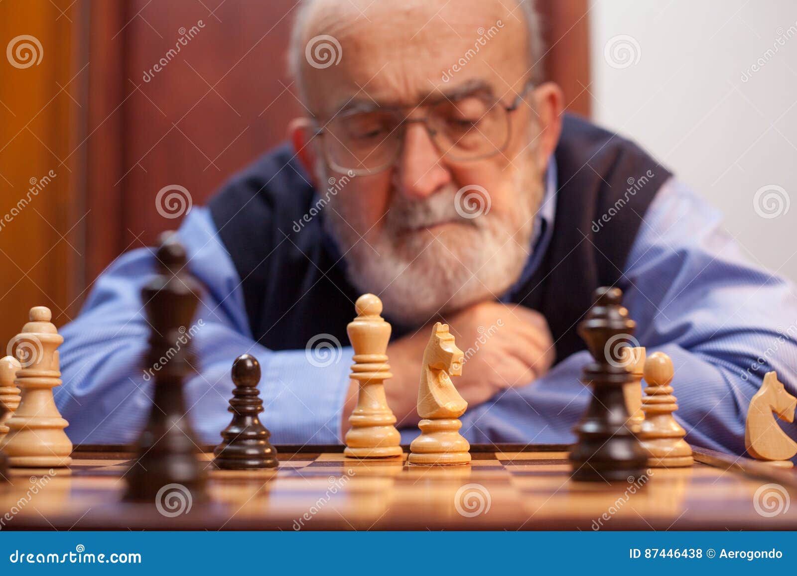 Old Man Playing Chess - Stock Photos