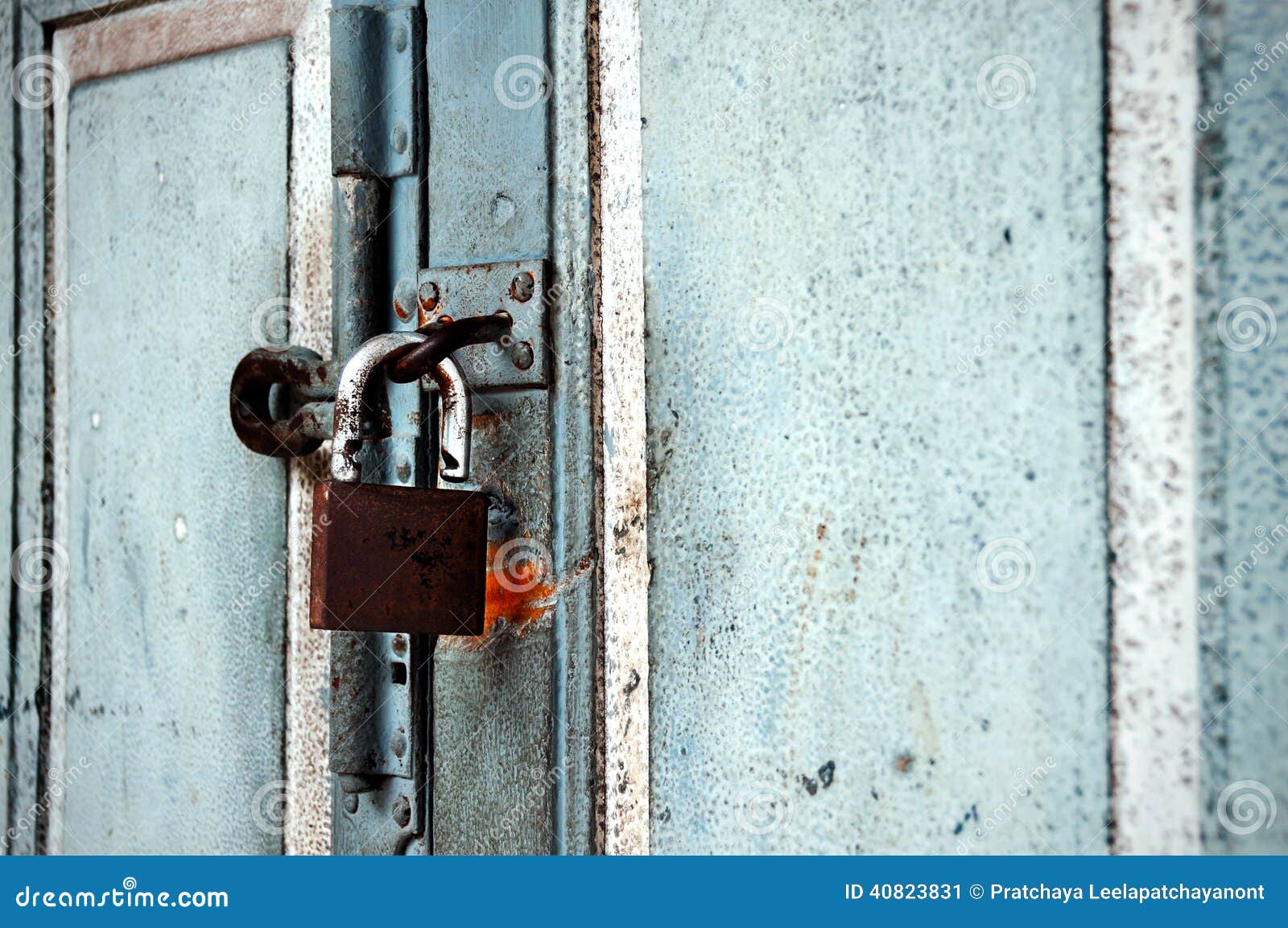 Old master key on wood door