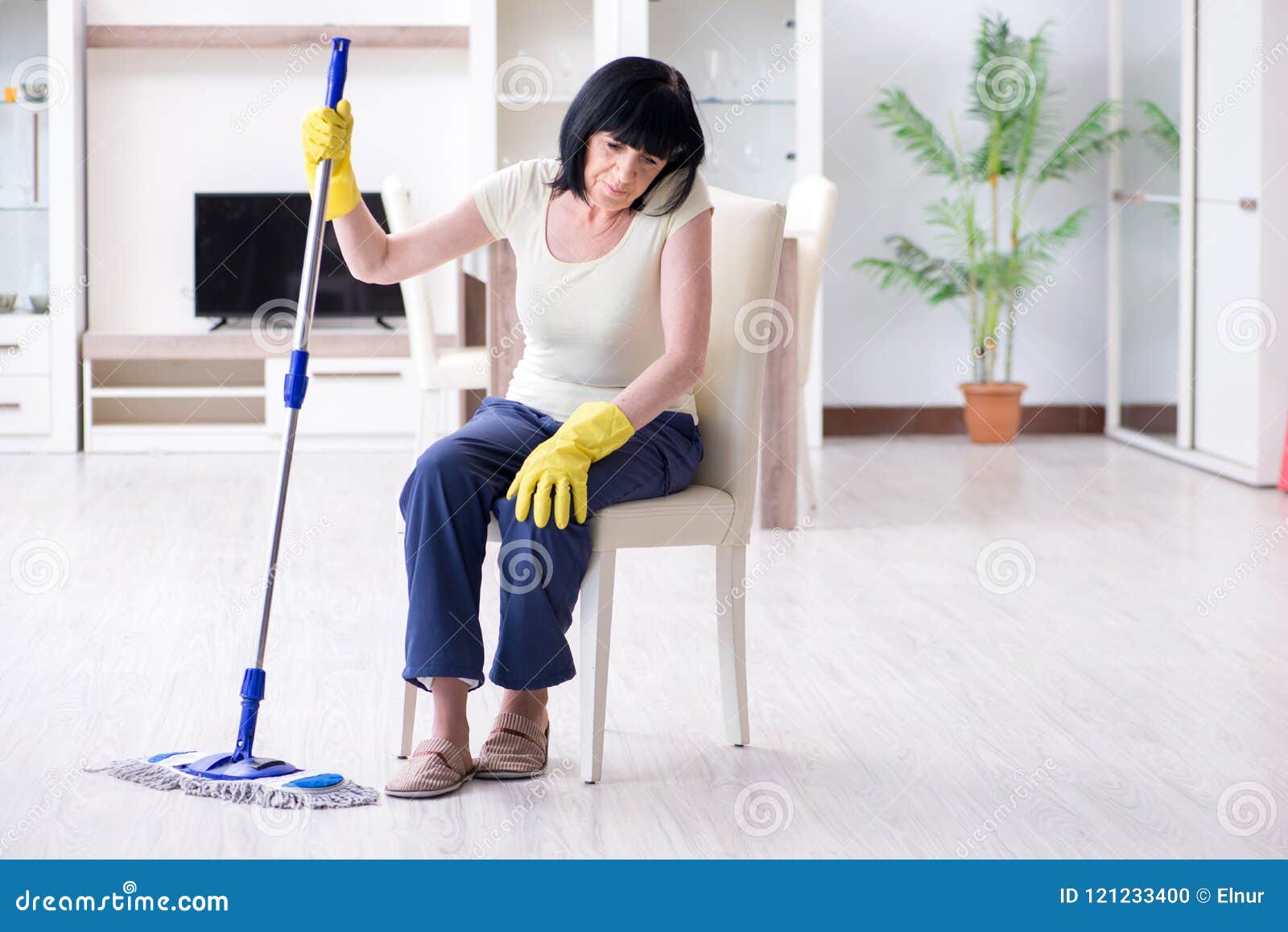 The Old Mature Woman Tired After House Chores Stock Photo Image