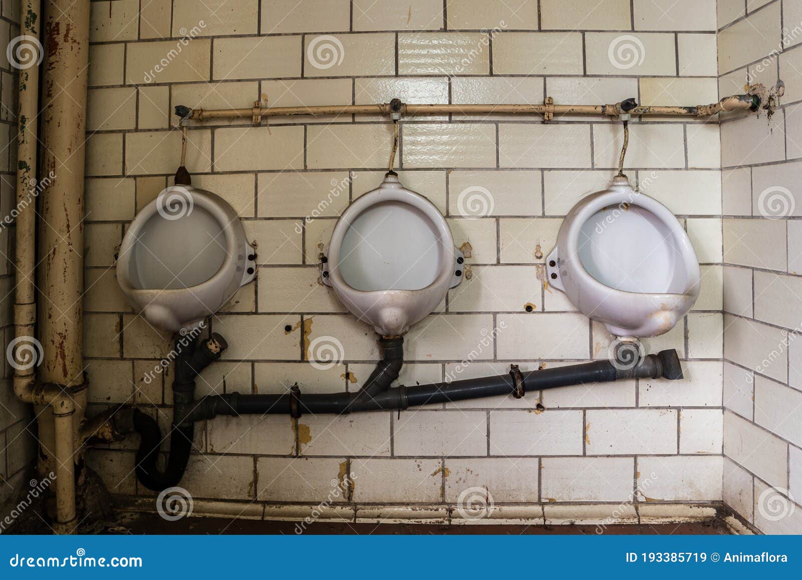 Old men s urinal stock image. Image of white, stare 193385719