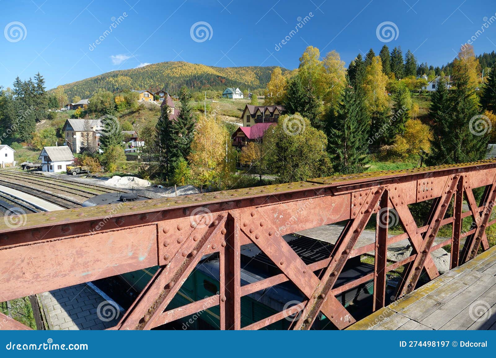 old metal bridge over railway tracks in vorokhta city, western ukraine